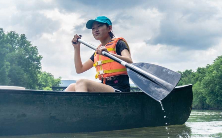 girls learn canoeing skills on outward bound course